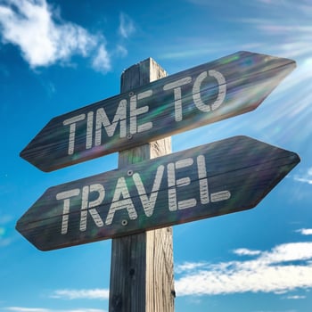 Wooden sign TIME TO TRAVEL outdoors, warm sunlight and blue sky background For Social Media Post Size photo