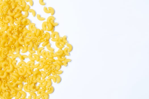 Macaroni isolated on the white background . photo