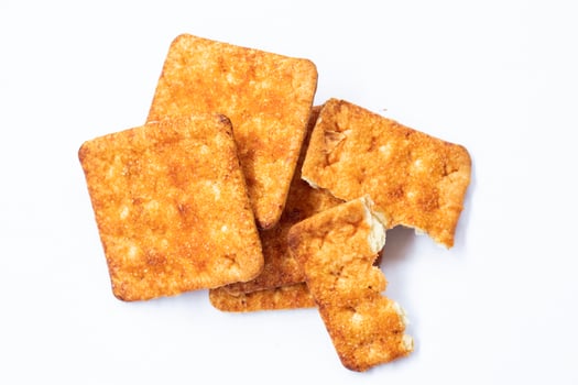 Pile of sweet digestive biscuits isolated on white. photo