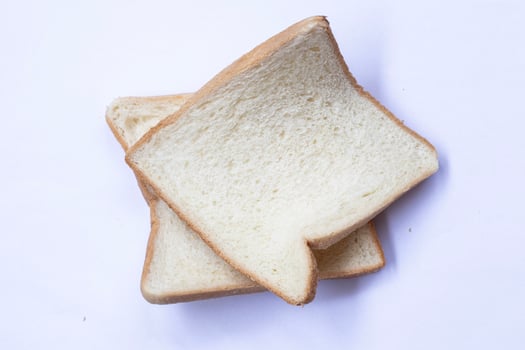 Bread slices isolated on white background. photo