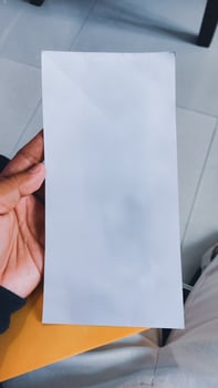 Shopping Receipt or white paper Held in Hand photo