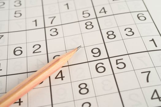 Sudoku puzzle, game to play for keep you brain younger for developing Alzheimer disease in senior patient. photo