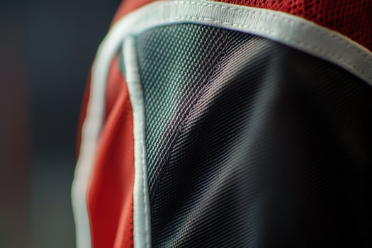 Close-Up of Sports Jersey Sleeve with Detailed Stitching and Logo Placement photo