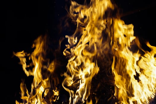 Intense Golden Flames Dancing In The Night photo