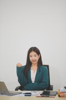 Business, finance and employment, female successful entrepreneurs concept. Friendly smiling office manager greeting new coworker. Businesswoman welcome clients with hand wave, hold laptop photo