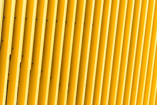 Detail of yellow metal building facade photo