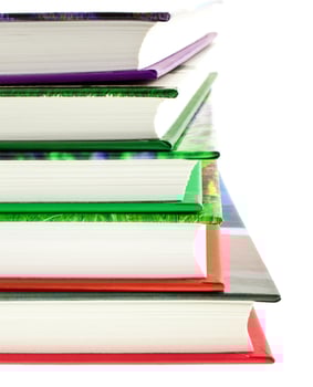 multicolored books stack isolated photo