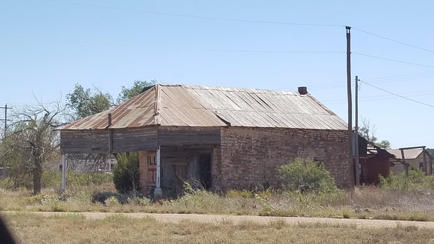 Abandoned Old Store, Boarded Up Building on the Side of the Road, New Mexico photo