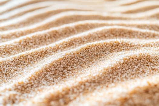 A close up of sand on a beach photo