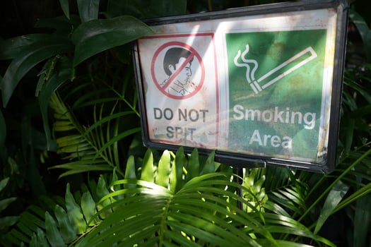 Bangkok, Thailand, 2024 - Road traffic on Bangkok road. cars on the streets of the metropolis. Bangkok, Thailand Sign of smoking area in the city, and do not spit sign photo