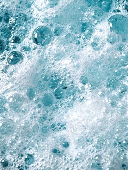 Sparkling blue water bubbles photo