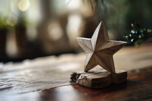 Wooden star decoration on rustic wooden surface photo
