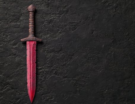 Rusty medieval sword on dark background photo