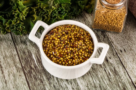 Mustard sauce with seeds in the bowl photo