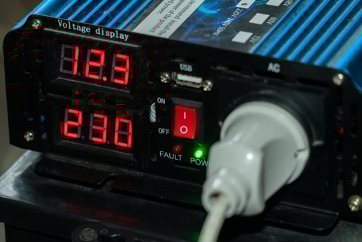 Voltage display device shows power levels and connection status photo
