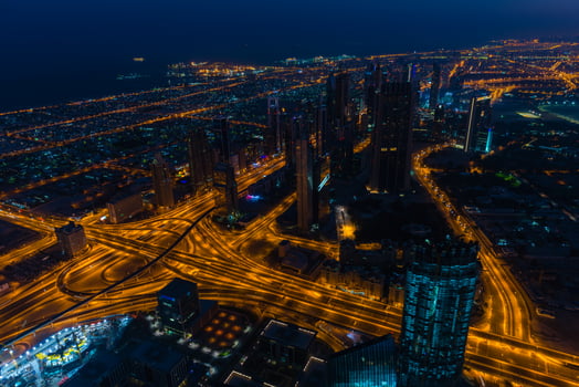 Dubai downtown night scene with city lights photo