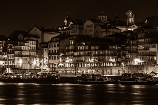 Overview of Old Town of Porto, Portugal at night. photo