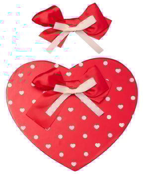 Gift red box with heart shaped bow on isolated background photo