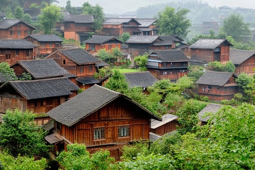 A village in the mountains with wooden houses photo