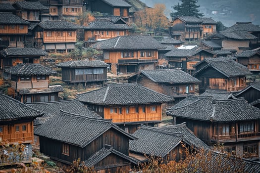 Densely packed traditional wooden houses on a hillside, showcasing dark gray roofs and orange wood. photo