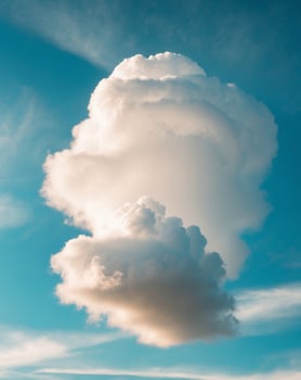 Cumulus Cloud Formation Under a Vivid Blue Sky photo