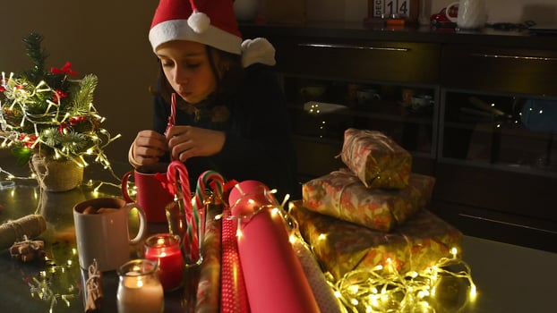 Child Celebrating Christmas with Decorations photo