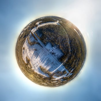 Little planet panorama of snowy Lapland landscape photo