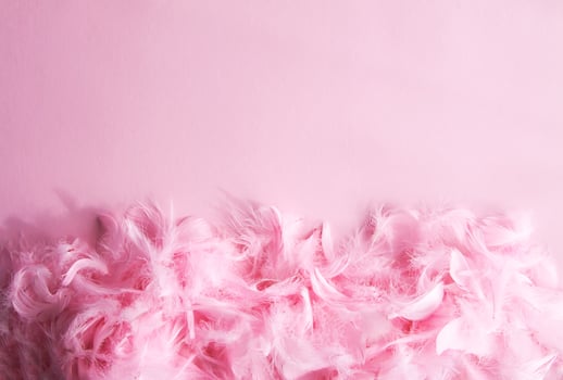 Easter composition with traditional decor of pink feathers. photo
