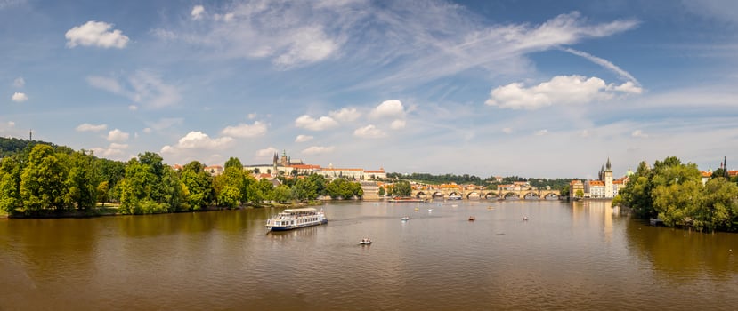 waterfront view across the river Vltava to Prague Castle and Charles Bridge, Prague, Czech republic photo