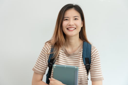 Portrait beautiful Asian woman student. Smile girl happy study. read book in college campus. young female on international Asia University. Education, study, school, learning, exam, continue education photo