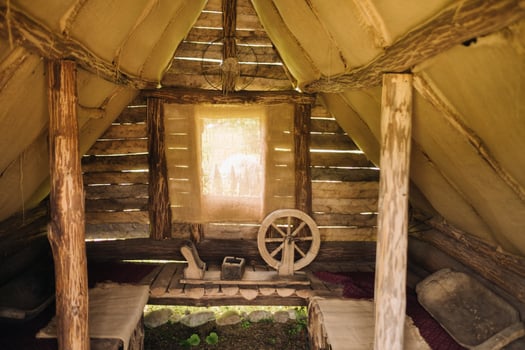 Interior in an old small wooden hut photo