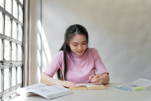 asian girl studying in the classroom photo