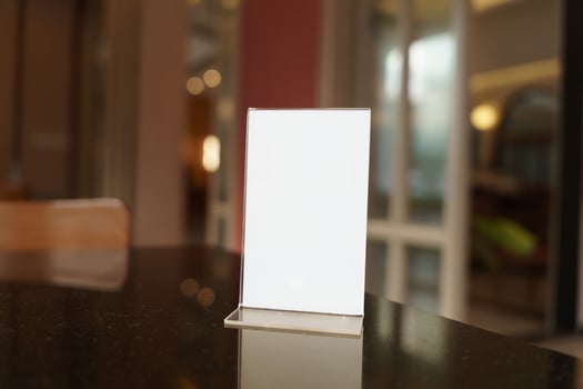 Menu mock up blank white on a table in a restaurant photo