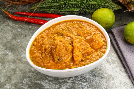 Indian cuisine - spicy chicken curry photo
