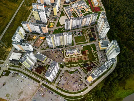 Aerial View of a Modern Residential Complex Highlighting Green Spaces and Design Features photo