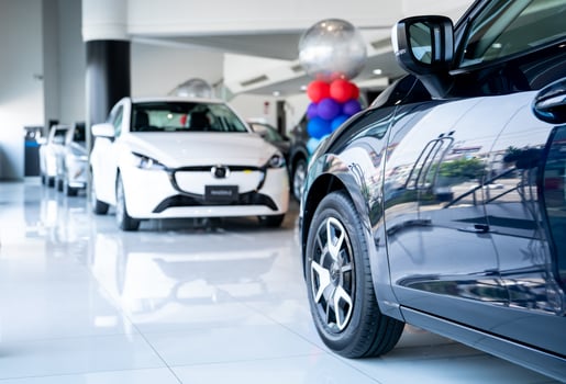 Car parked in luxury showroom. Car dealership office. Car showroom business. New car parked in modern showroom. Auto for sale and rent business. Automobile leasing and insurance. Electric automobile. photo
