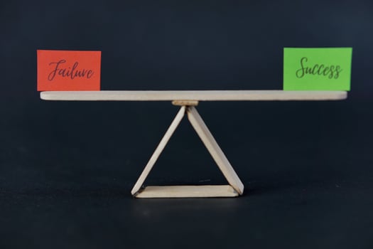 concept of duality using sticky notes with the antonym words Failure - Success made by hand on a dark background photo