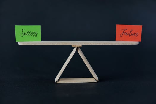 concept of duality using sticky notes with the antonym words Failure - Success made by hand on a dark background photo