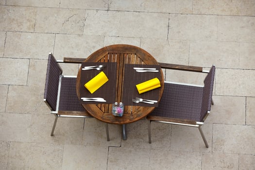 Outdoor summer cafe tables with chairs photo