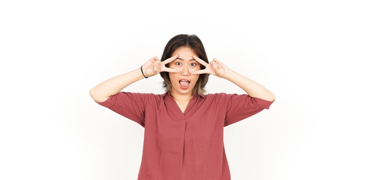 Showing Peace Sign Of Beautiful Asian Woman Isolated On White Background photo