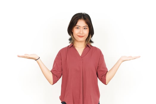 Showing Two Product on Open Palm Of Beautiful Asian Woman Isolated On White Background photo