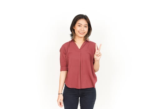 Showing Peace Sign Of Beautiful Asian Woman Isolated On White Background photo