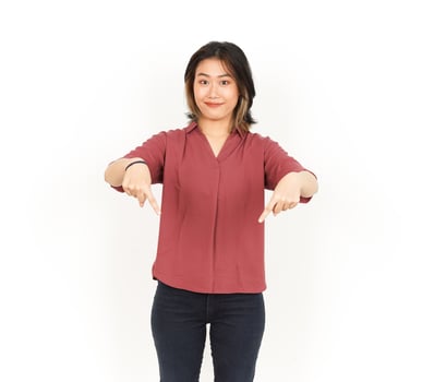 Presenting and Pointing down Product Of Beautiful Asian Woman Isolated On White Background photo