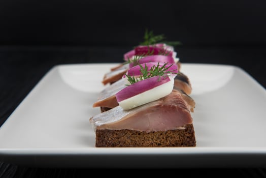 Sliced salted herring photo