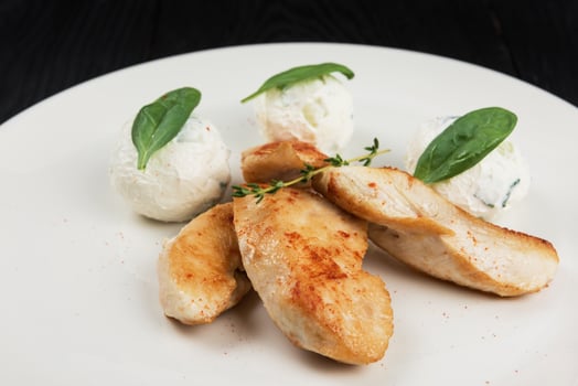Grilled chicken breast with mozzarella cheese. photo