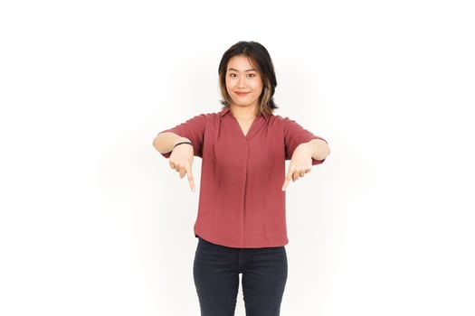 Showing Product and Pointing Down Of Beautiful Asian Woman Isolated On White Background photo