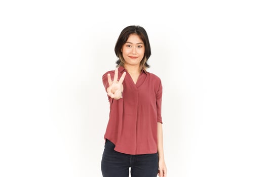 Showing Three Finger Of Beautiful Asian Woman Isolated On White Background photo