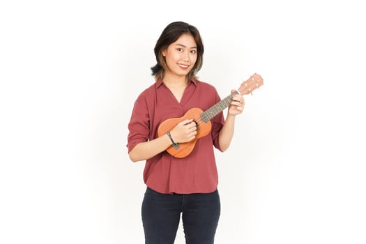 Playing Ukulele Of Beautiful Asian Woman Isolated On White Background photo