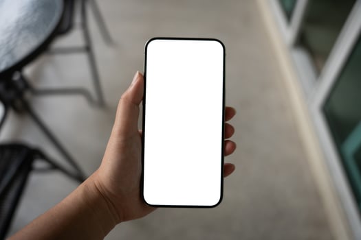 Smart phone mockup. Women hands holding cell telephone blank copy space screen smartphone blank white screen isolated technology concept. photo