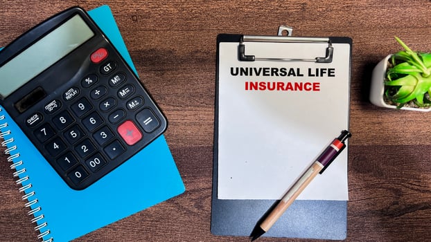 Concept of Universal Life Insurance write on paperwork isolated on Wooden Table. photo